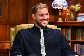 Colton Underwood in a black shirt and tie on The Traitors Season 4