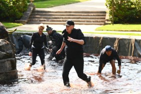 Michael Rapaport running through a fountain on The Traitors Season 4