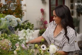Meghan Markle picking flowers in a garden on With Love, Meghan